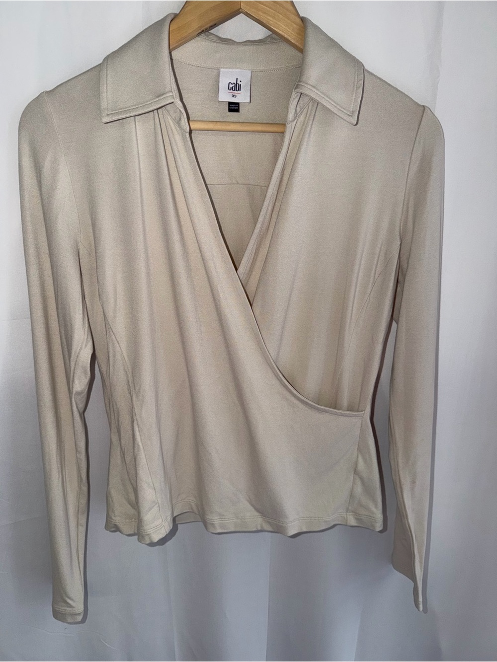 CAbi Cream Faux-Wrap Button Down Top